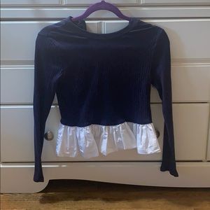 Long sleeved top with ruffle bottom